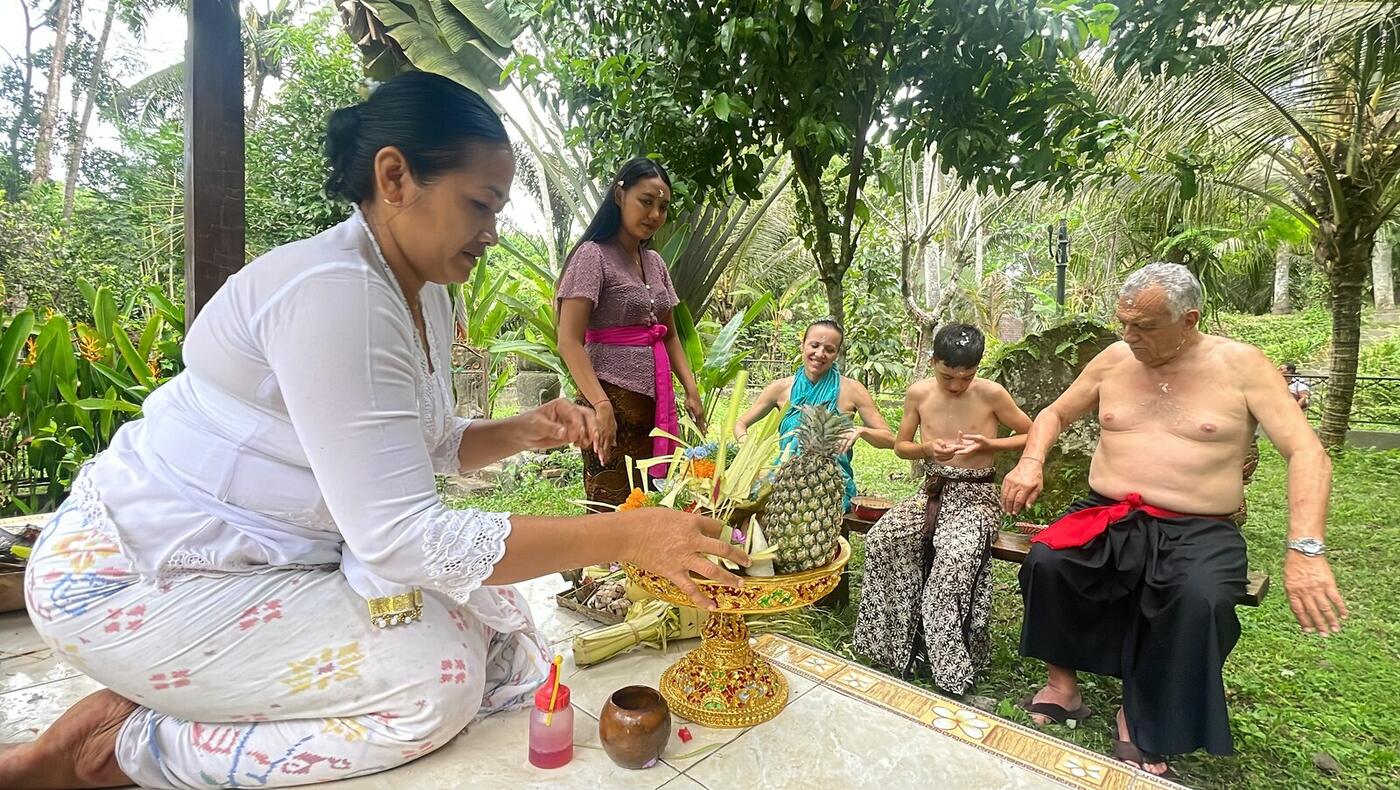 Priestess performing a blessing ceremony at the spring